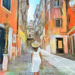young woman walking on cobblestone street of an o